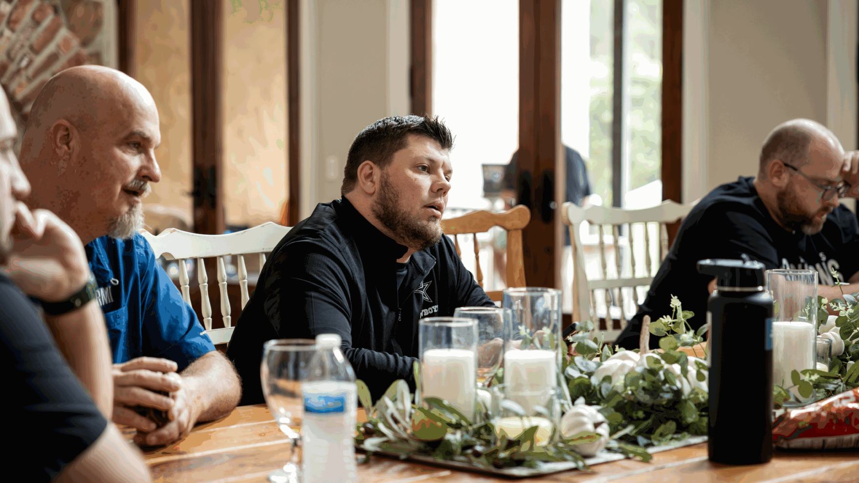 Leaders around the table during a retreat session