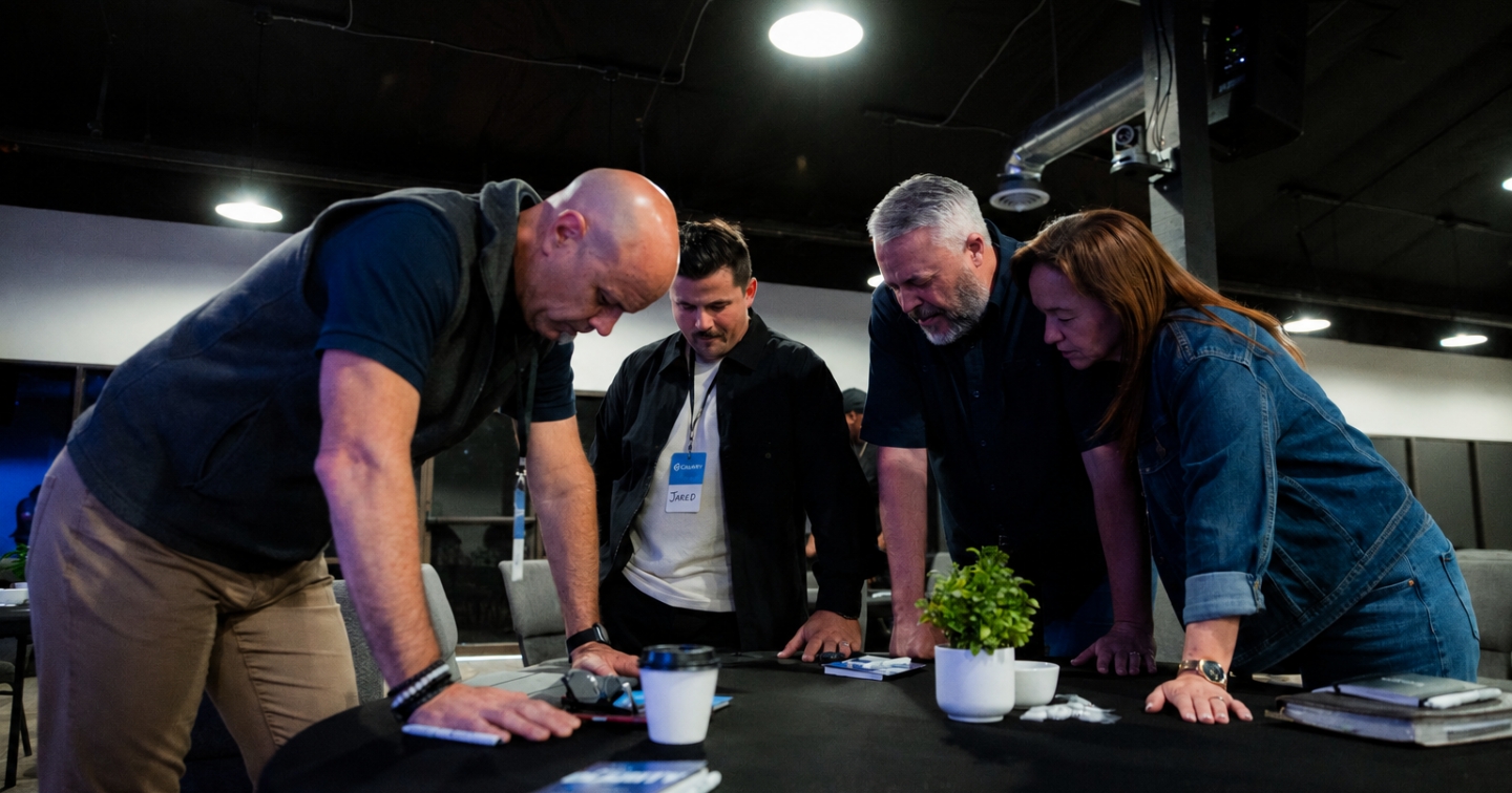 Leaders praying together at a Clarity gathering